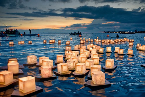 Floating Lanterns Launched at Sunset