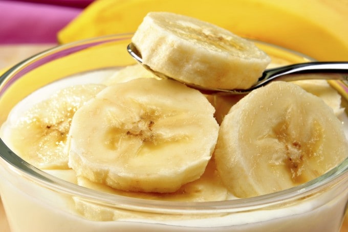 some organic banana slices with natural yoghurt